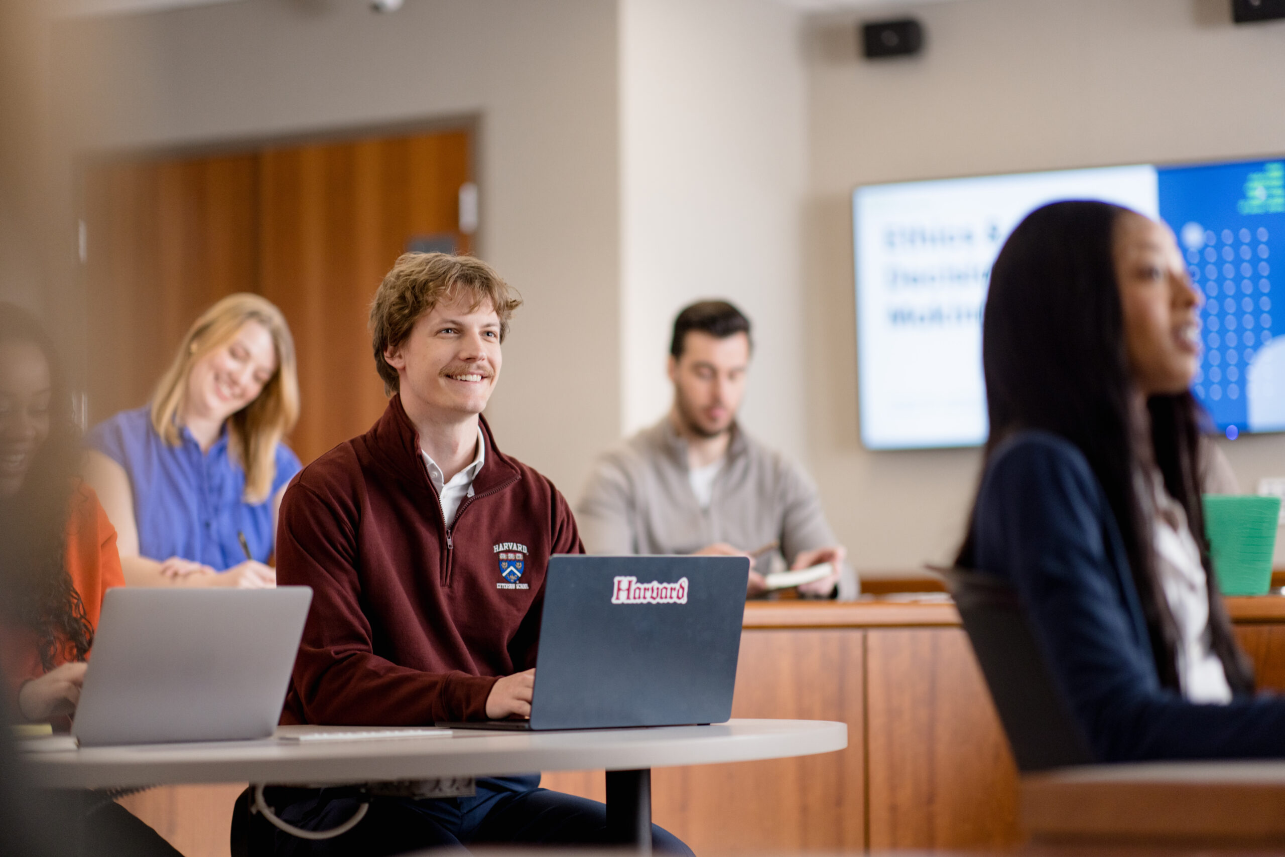 Harvard Extension School students sit in a classroom.